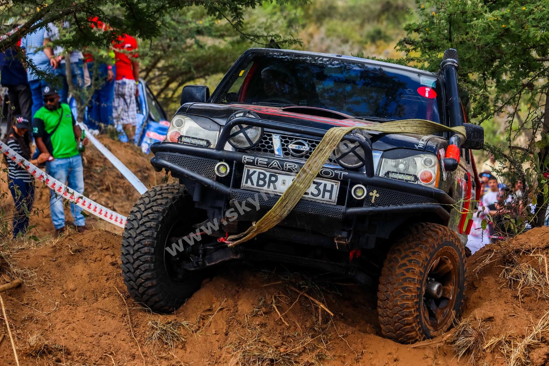 4x4 off-road vehicle competing on a muddy track
